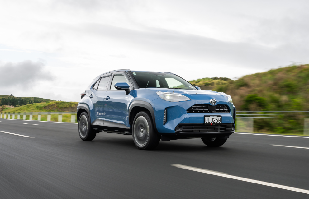 A Toyota Yaris Cross driving on a highway